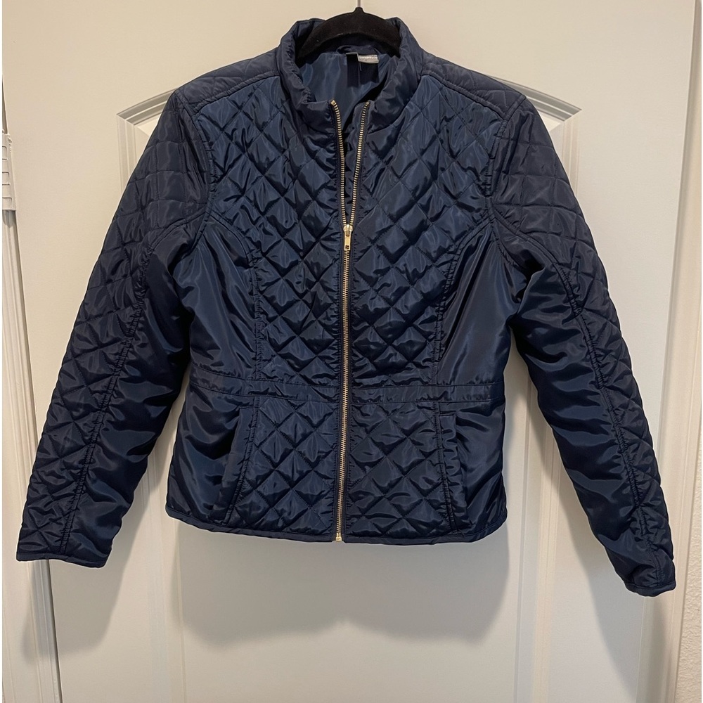 Navy fitted quilted jacket.